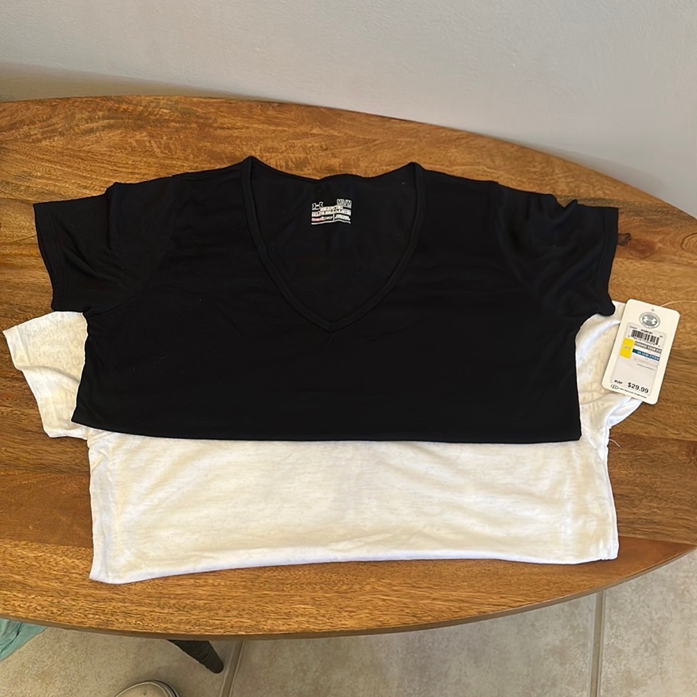 3 women’s Under Armour tees